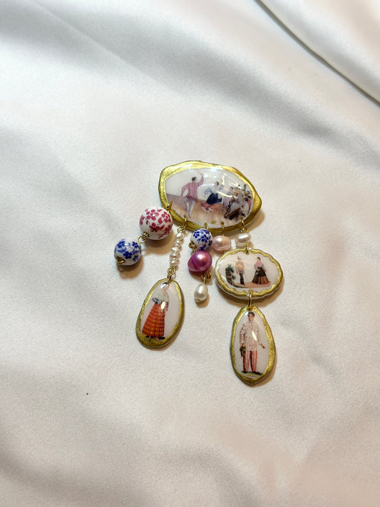 Nagkakilala, Nag-ligawan, Kinasal (they met, they courted, they got married) Brooch