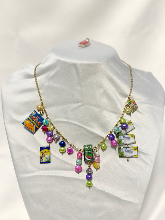 Sari Sari Essentials Shampoo, Ligo Sardines, Birch Tree, Sinigang Mix, and Mr. Chips Chain Necklace
