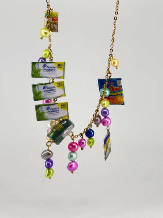 Sari Sari Essentials Shampoo, Ligo Sardines, Birch Tree, Sinigang Mix, and Mr. Chips Chain Necklace